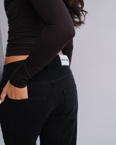 Studded Jeans — Black — Pocket and label detail
