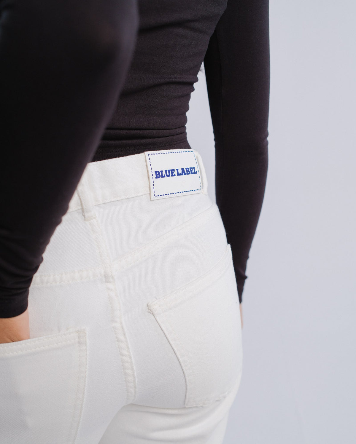 Studded Jeans — White — Pocket and label detail