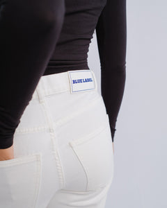 Studded Jeans — White — Pocket and label detail